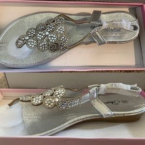 Never worn sandals! Still packaged in the box!